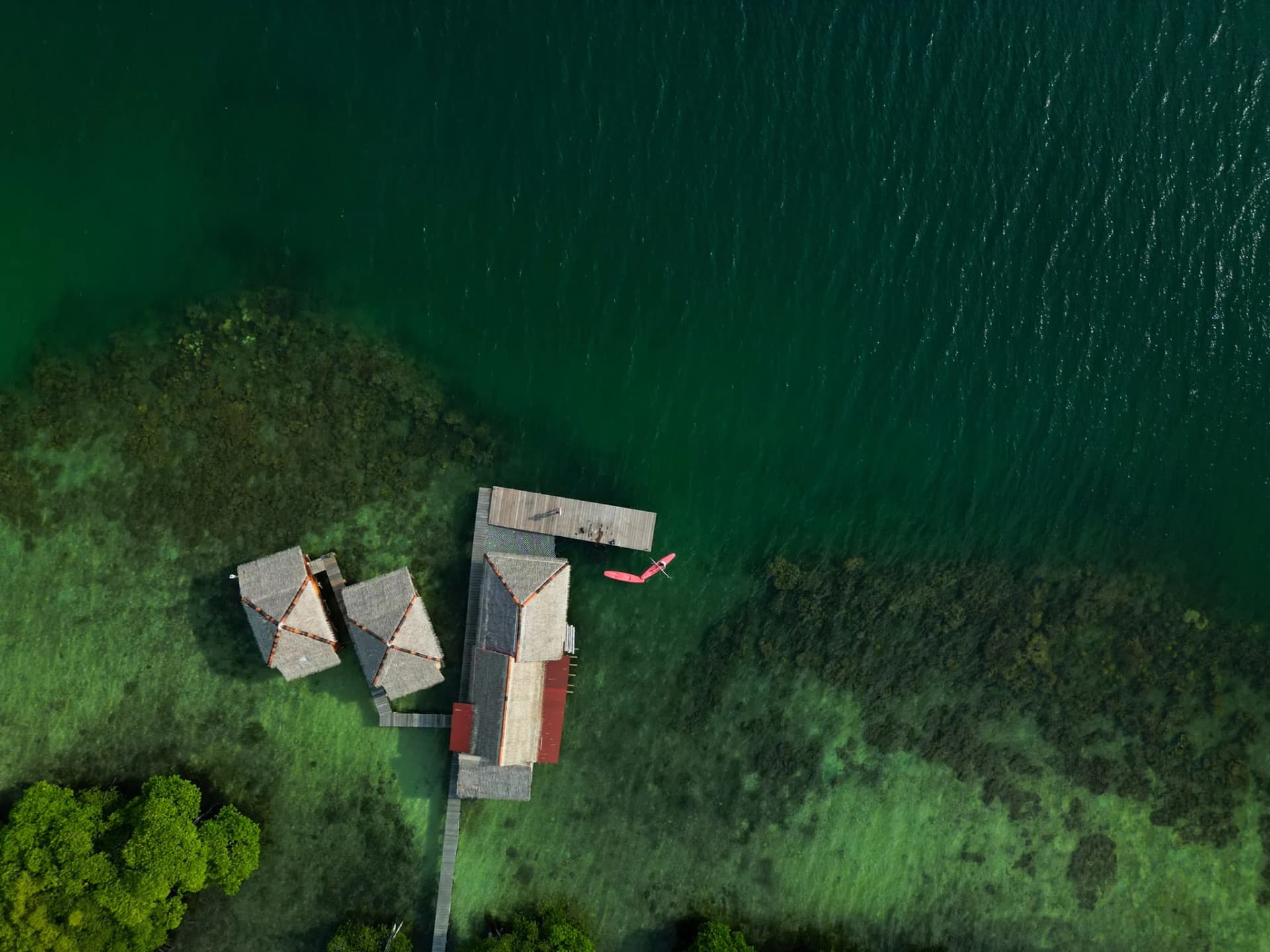 Interior of a rustic oceanfront room at Floating Paradise